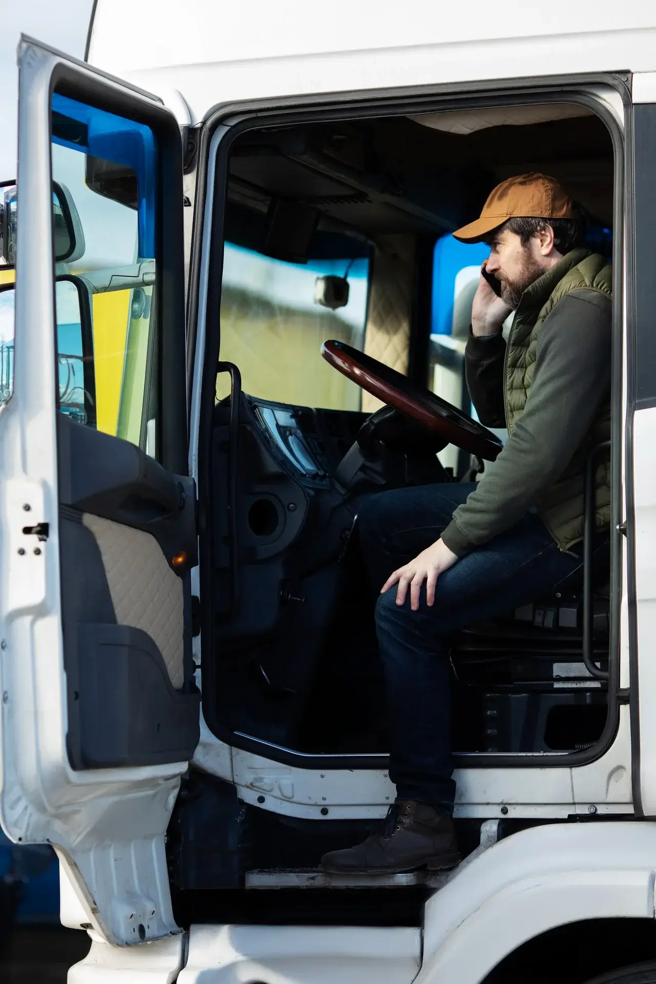 Driver smiling driving his truck